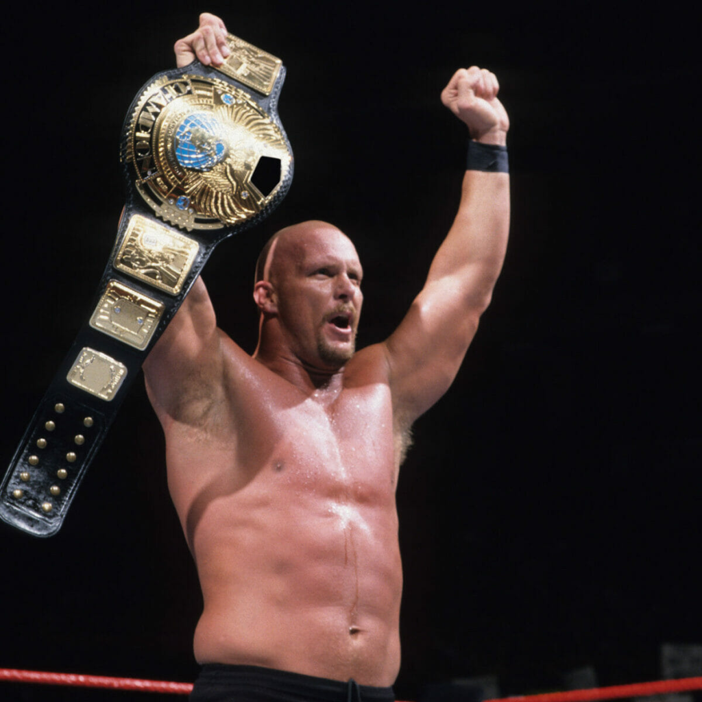 Steve Austin with one of his championship belts