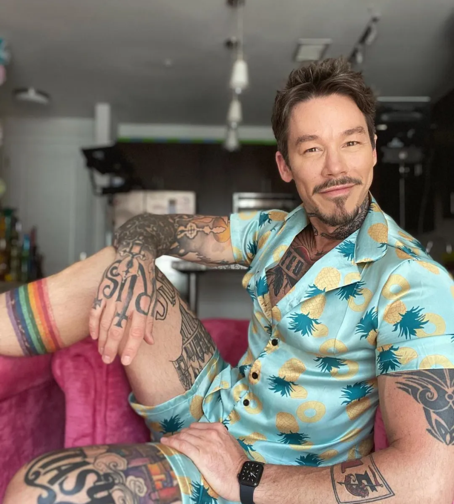 David Bromstad showing off his tattoos