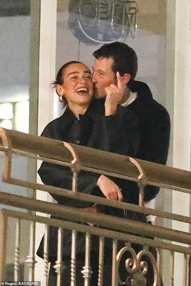 Dua Lipa with Callum Turner during a very public display of affection in Hollywood