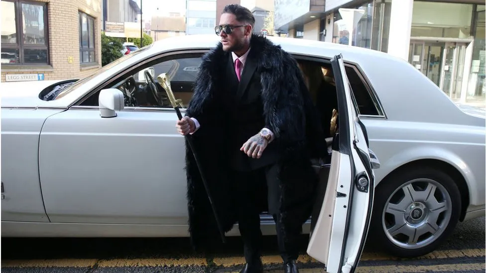Stephen Bear arriving at court for hearing in a Rolls Royce