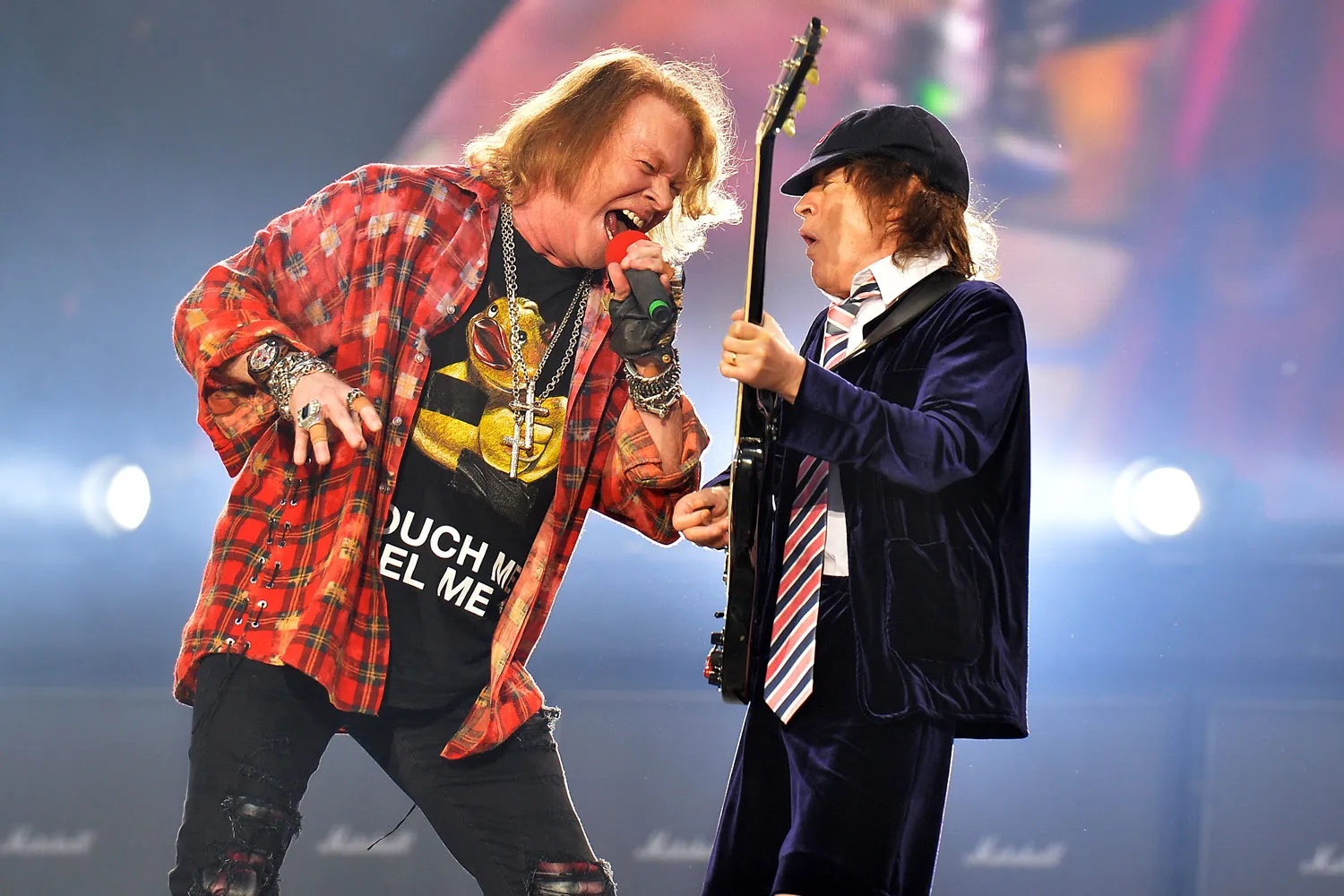 Axl Rose performing with Angus Young of the band AC/DC 