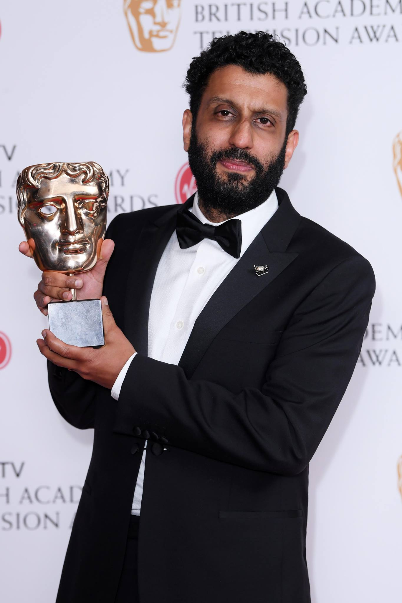 Leading Actor winner Adeel Akhtar with his BAFTA for his performance in 'Murdered By My Father'